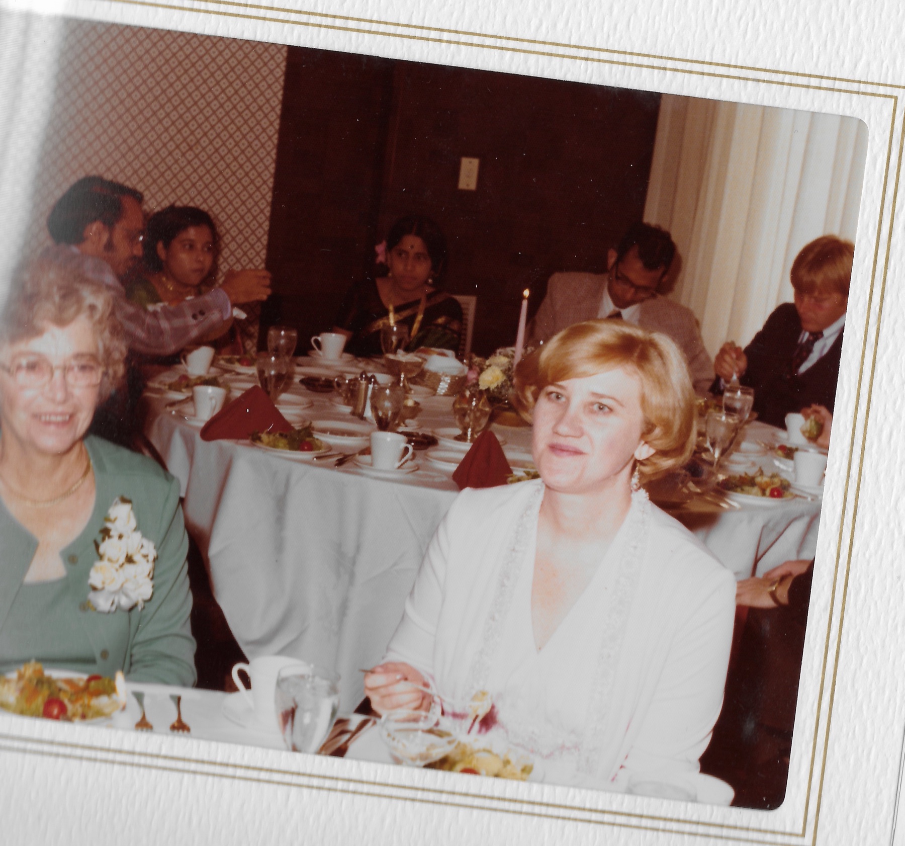 Mary Lee seated at the reception dinner beside her mother